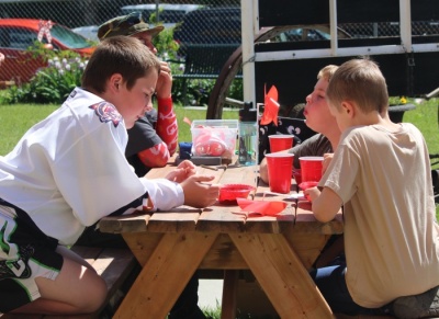 Kids love sitting on the picnic tables in the Museum Gardens.