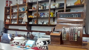 Our gathering place.  We host coffee and conversations here.  This room is available for private and public user groups to meet. Articles are from Merchant shops of the 1930s, 1940s, and into the 1960s.