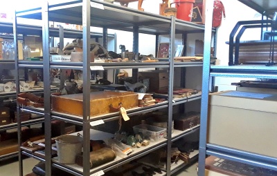 Our storage room is organized so any properly labelled artifact can be found, ready for public viewing or to display a fresh exhibit.